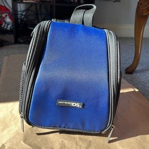 Nintendo DS blue mini backpack carry case. Small but lots of storage.